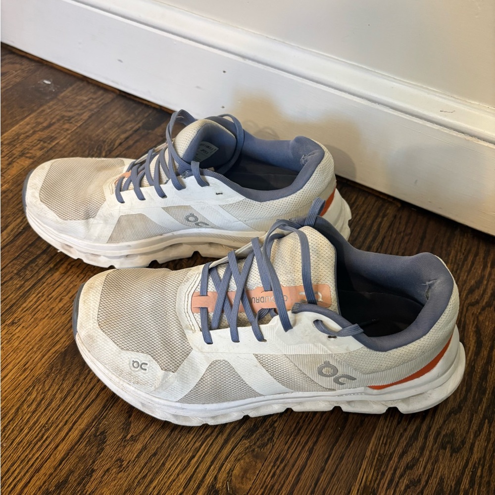 On Running White and Blue Sneakers